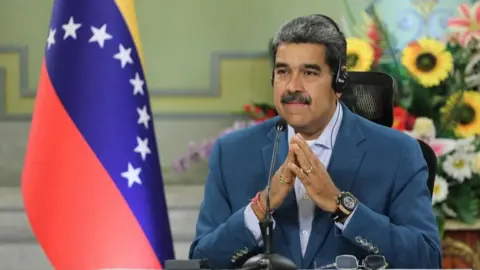 Reuters Presiden Venezuela Nicolas Maduro tersenyum dalam sebuah acara di Caracas, Venezuela, pada 8 Agustus 2024.