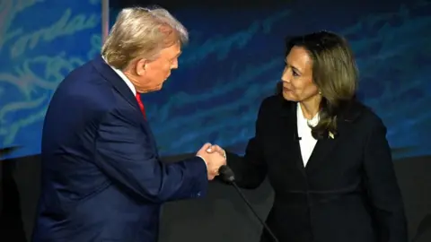 Getty Images Donald Trump dan Kamala Harris