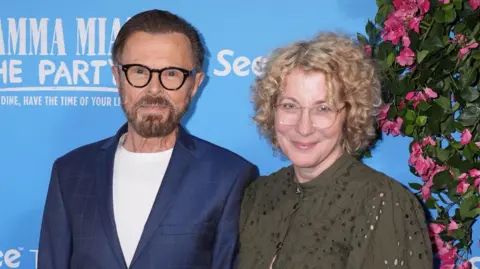 Foto EPA Björn Ulvaeus bersama istrinya Christina Sass.