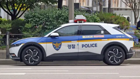 Getty Images Mobil polisi Korea Selatan