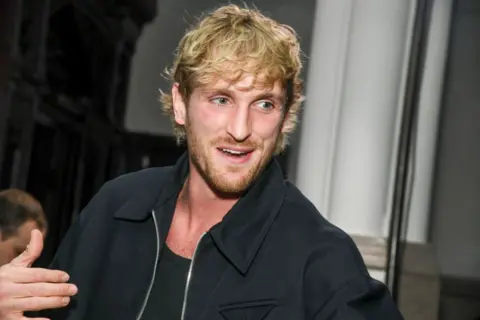 Getty Images Foto kepala dan bahu Logan Paul, dengan rambut pirang acak-acakan dan janggut.