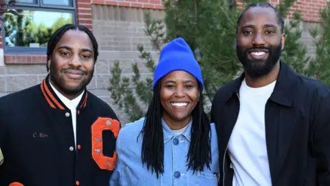 Ajak Malcolm Washington, Katia Washington dan John David Washington menghadiri pemutaran film 